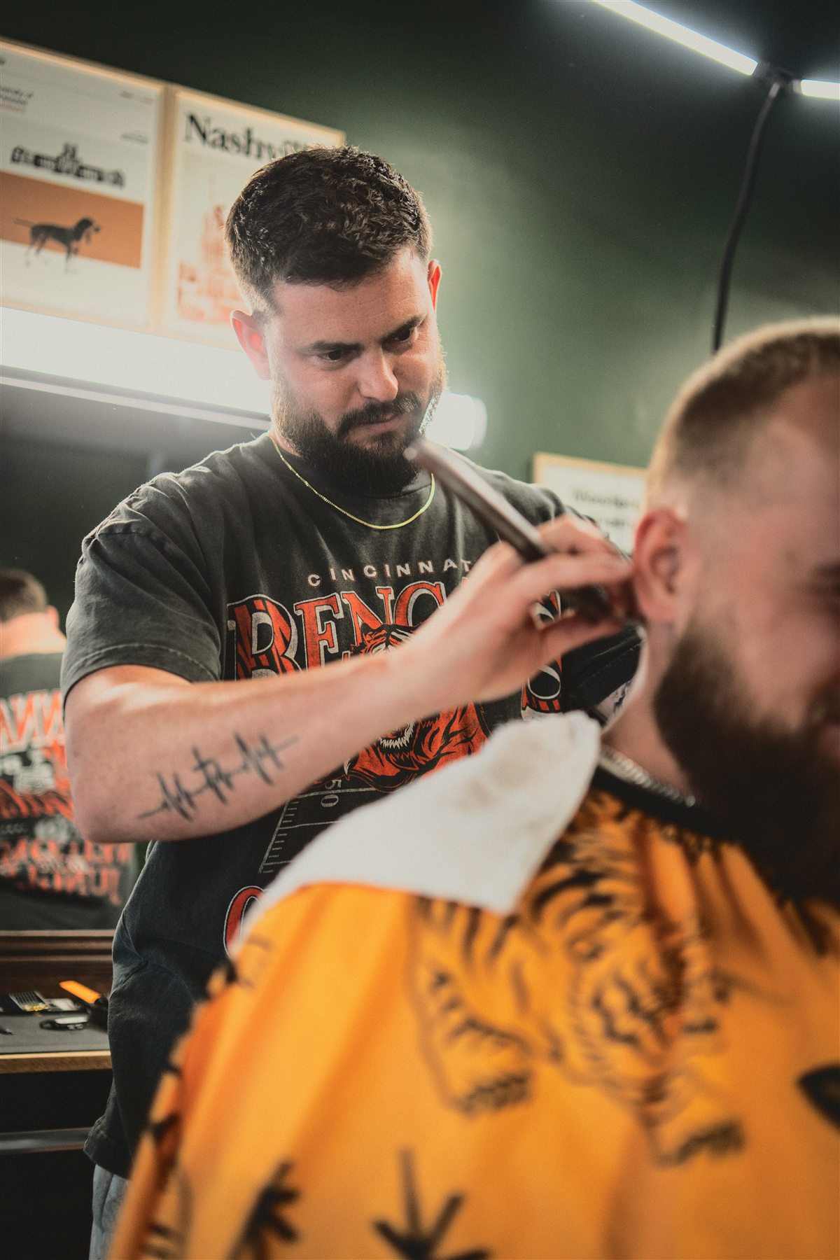 A Greensborough barber giving a client a precise cut